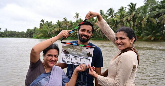 Cristo Tommy, Parvathy and Urvashi during the shoot of Ullozhukk