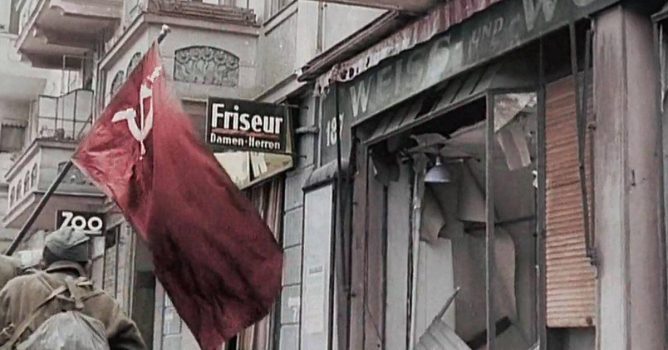 One of the last battles of the Russian Red Army, Bolshevik soldiers marching with a red flag