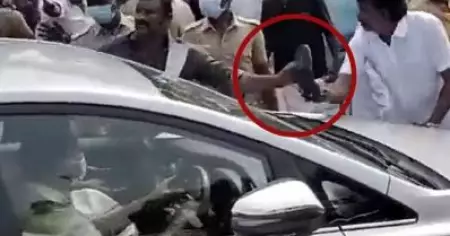 ജയലളിത സ്മാരകത്തില്‍ എത്തിയ മുന്‍ മുഖ്യമന്ത്രി പളനിസ്വാമിയുടെ കാറിന് നേരെ ചെരിപ്പേറ്
