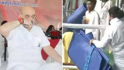 അമിത് ഷായുടെ യോഗാ പരിപാടിയില്‍ വിരിച്ച പായകള്‍ നാട്ടുകാര്‍ കൊണ്ടുപോയി; കാഴ്ച്ചക്കാരായി സംഘാടകര്‍