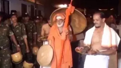 പുഷ്പാഞ്ജലി സ്വാമിയെ ആര്‍.എസ്.എസ്സുകാര്‍ കയ്യേറ്റം ചെയ്തതായി പരാതി; അമ്പതോളം പേര്‍ക്കെതിരെ കേസ്