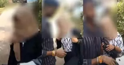 ഹിന്ദു യുവാവിന്റെ കൂടെ സ്‌കൂട്ടറില്‍ സഞ്ചരിച്ചു; വഴിയില്‍ തടഞ്ഞുനിര്‍ത്തി യുവതിയുടെ ബുര്‍ഖ അഴിപ്പിച്ചു