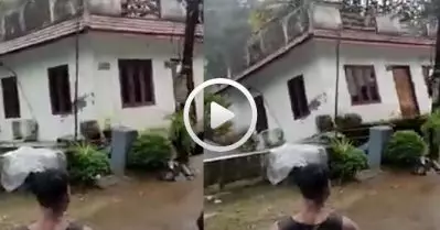 മലവെള്ളപ്പാച്ചിലില്‍ നിലംപൊത്തി ഇരുനില വീട്; ഞെട്ടിപ്പിക്കുന്ന ദൃശ്യം