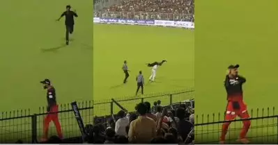 വിരാടിനെ കെട്ടിപ്പിടിക്കാന്‍ ഗ്രൗണ്ടിലിറങ്ങിയ ആരാധകനെ ജോണ്‍ സീന സ്‌റ്റൈലില്‍ തൂക്കിയെടുത്ത് പൊലീസ്; RKO അടിച്ചോ എന്ന് കോഹ്‌ലി